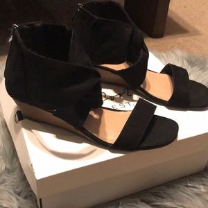 Cute black criss cross sandals.